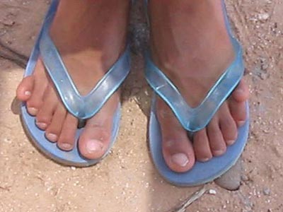 Toes in blue sandals